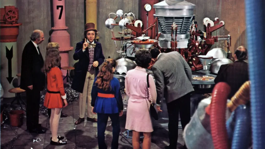 Willy Wonka accoglie i bambini nella fabbrica di cioccolato